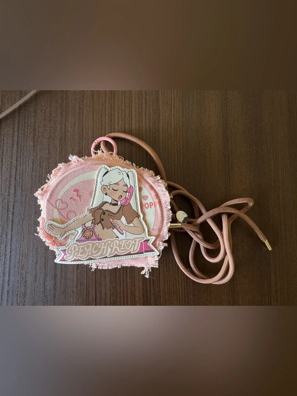 Peach Riot Pink Graphic Round Crossbody Bag